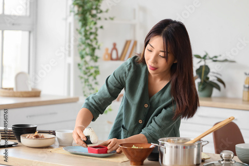Young Asian woman preparing...