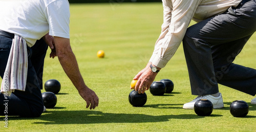 Senior Men Playing Lawn Bowls on a Sunny Green Field