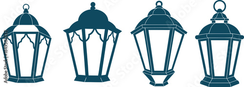 Four black metal lanterns with glass panels in a row on white background