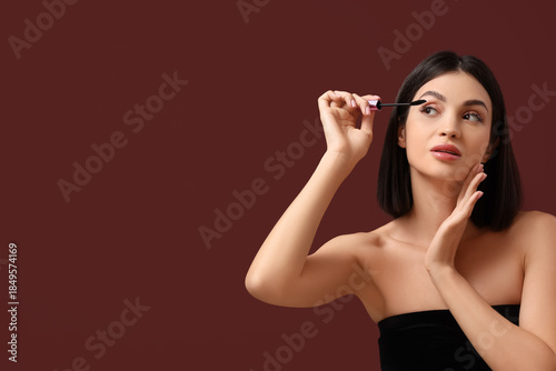 Beautiful young woman apply...
