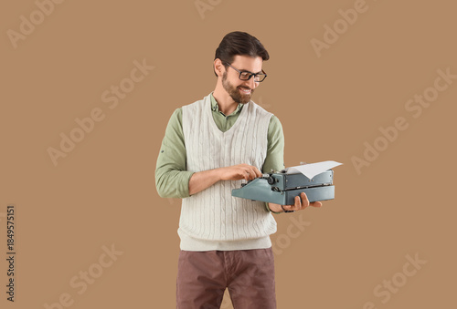 Young happy male writer wit...