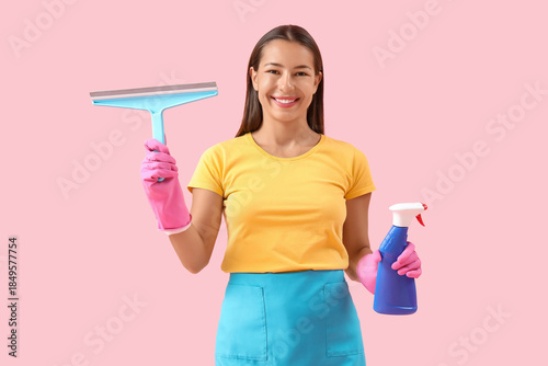 Female janitor with squeege...