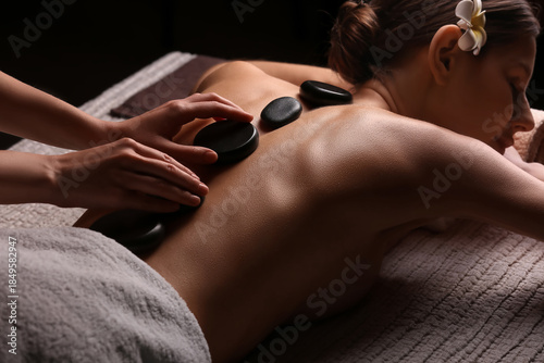 Young woman getting massage...