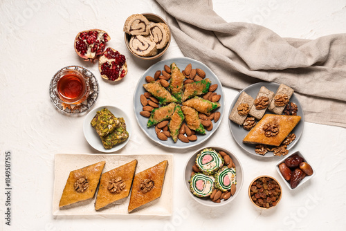 Wallpaper Mural Composition with different Eastern dishes and cup of tea on light background. Ramadan celebration Torontodigital.ca