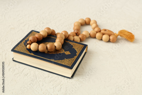 Koran and prayer beads for ...