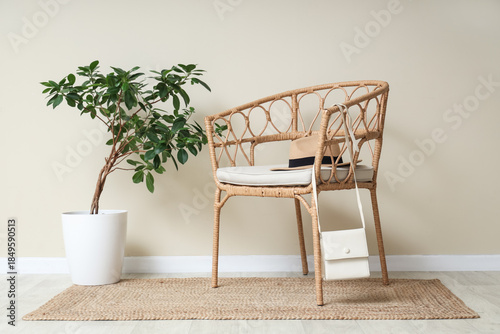 Armchair with hat, bag and ...