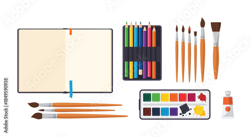 Art supplies including notebook, pens, brushes, and watercolors.