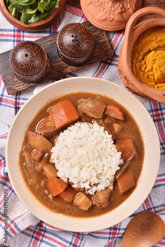 Pork curry with rice in a bowl