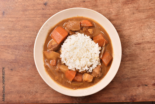 Pork curry with rice in a bowl