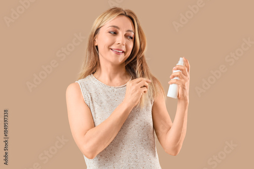 Mature woman with hair care...