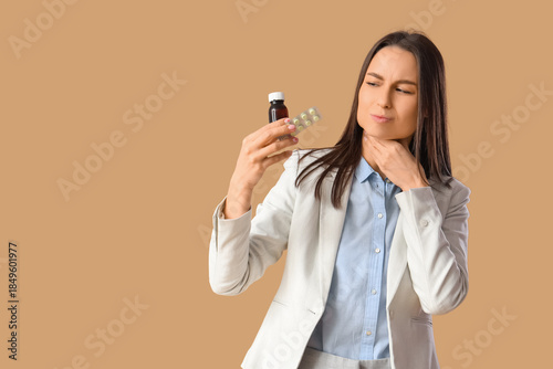 Young woman with syrup and ...