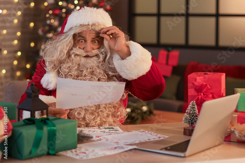 Shocked Santa Claus reading...
