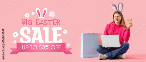 Young woman in bunny ears w...