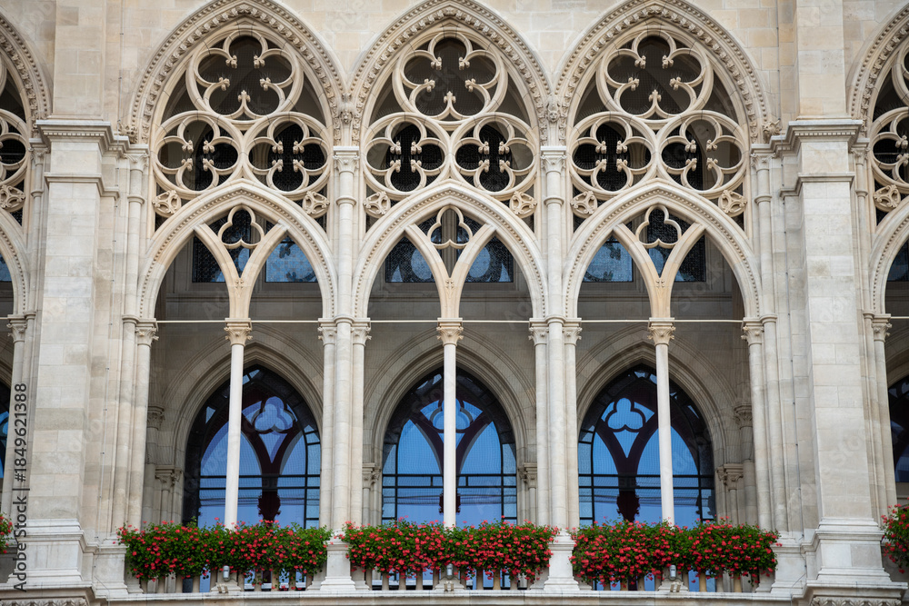 Fototapeta premium Neo-Gothic Arches with Flower Boxes on Vienna City Hall Facade - Austria