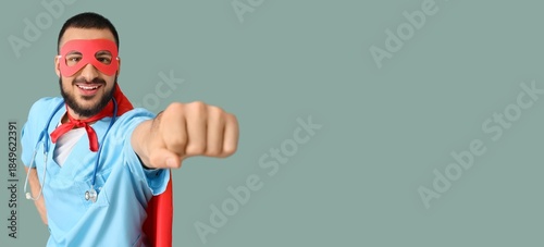Male doctor dressed as supe...