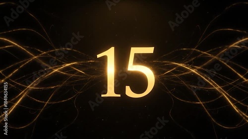 Radiant golden number fifteen with abstract glowing energy lines on a black backdrop