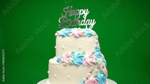 Two-tier birthday cake white, pink/blue buttercream roses, pearls, 
