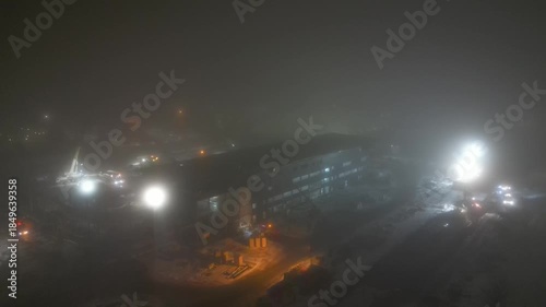Aerial view of foggy construction sight in early December morning