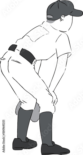 膝に手を置いている野球選手