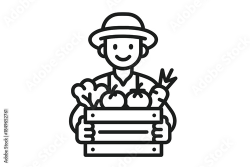 Happy farmer holding a crate of fresh vegetables and fruits