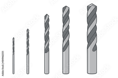 Variety of Drill Bits in Increasing Size on Dark Background