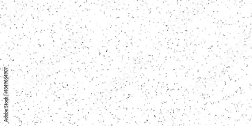 Dense scattering of small, irregular grey and white mosaic shapes creating a textured abstract background on a clean white surface for graphic design use
