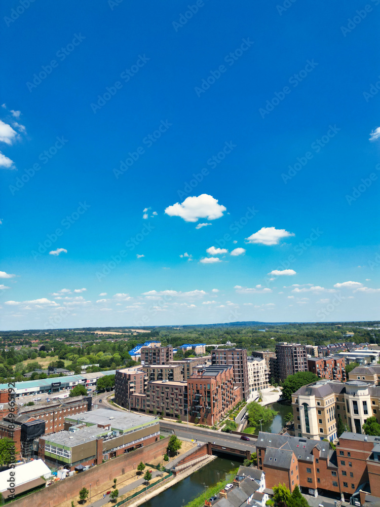 Fototapeta premium High Angle Street View and Buildings at Central Reading London City and Town Centre. Aerial Drone Tour of England United Kingdom. July 11th, 2025. 