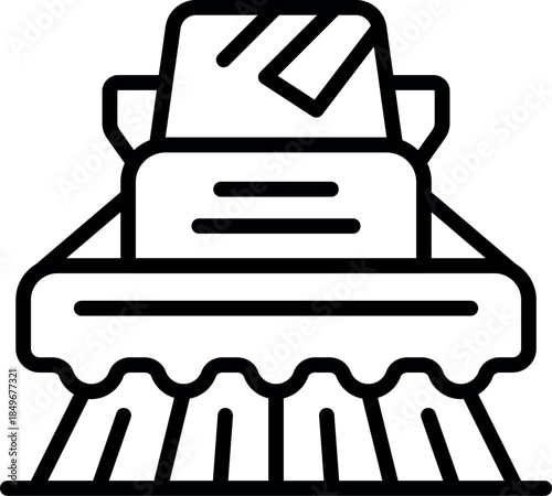 Combine harvester working on a wheat field, gathering crops during harvest season