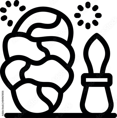 Freshly baked challah bread sprinkled with sesame seeds, ready for the shabbat dinner