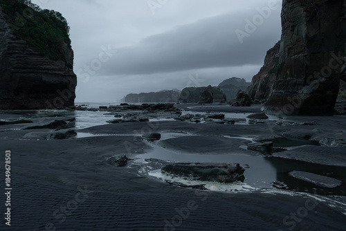 Cloudy and moody view on the coastline of New Zealand.
