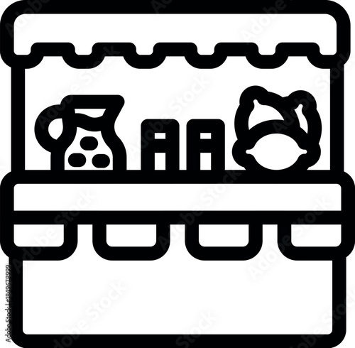 Freshly squeezed juice and lemons sold at a market stall, promoting healthy eating and local businesses