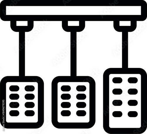 Car pedals enabling acceleration, braking, and clutch control, essential for safe driving