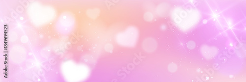 Pink bokeh heart background with glitter and sparkle effects. Love themed soft gradient pattern with light elements, cute pastel colors and romantic dreamy atmosphere for Valentine Day design.