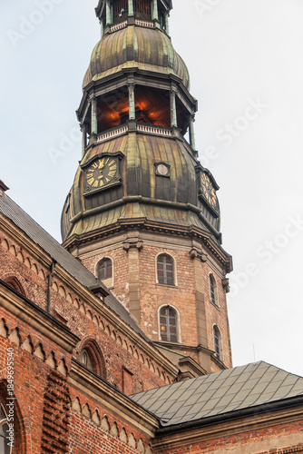 Tower clock of the famous St. Peter Church, Old town, Riga, Latvia. Saint Peters Lutheran church in Riga, Latvia