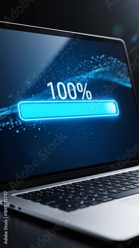 Laptop screen displays a glowing blue progress bar with digital particles