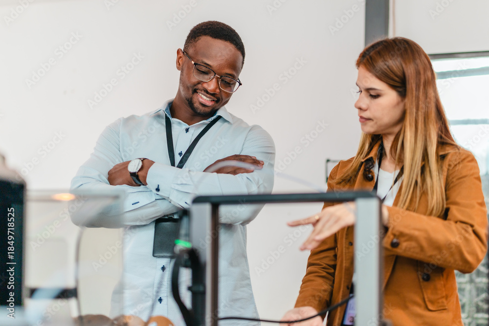 Obraz premium Two Product Designers Testing 3D Printed Prototypes