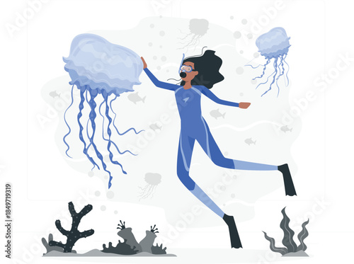 Woman in blue wetsuit swimming with jellyfish underwater d