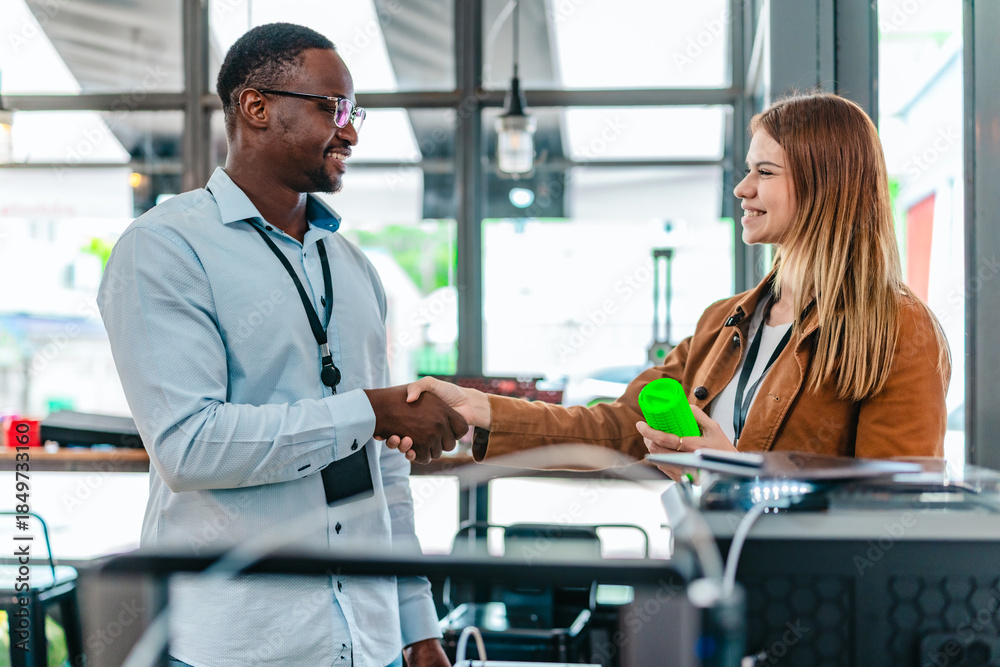 Obraz premium Two Product Designers Testing 3D Printed Prototypes