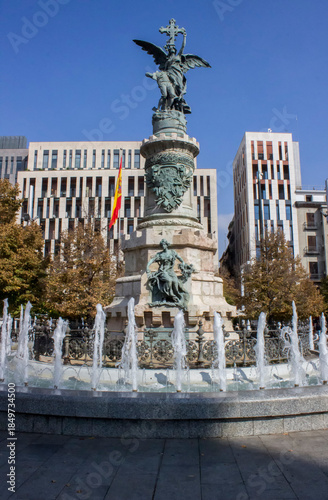 A decorative fountain with sculptures in the city of Zaragoza