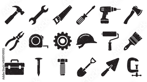 Collection of black grunge construction tool icons featuring a hammer, saw, drill, wrench, and other hardware for building, repair, and DIY projects in a flat silhouette style