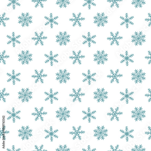 Seamless pattern with flat blue snowflakes of various shapes, symmetrical, and chaotic. Minimalistic winter design for wrapping paper, Christmas gifts, seasonal textile prints, or festive digital