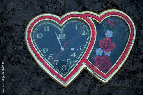 Photo of broken heart shaped wall clock