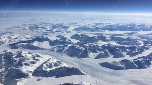 Greenland's icy mountains  from above 
