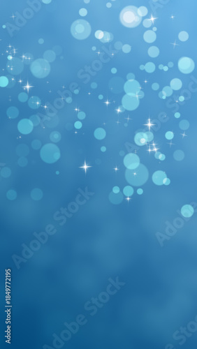 Blue Particles Illustration Vertical. Blue background with white glow, particles and stars, vertical format.
