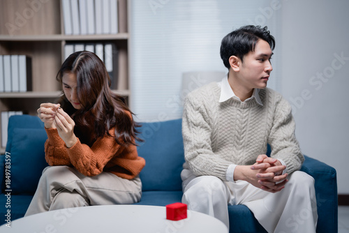 Quadro su tela Young couple facing relationship problems, woman rejecting a marriage proposal