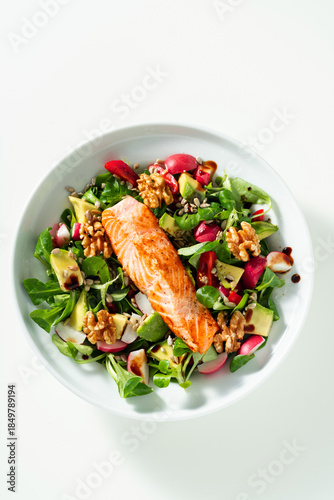 Nutritious Green Salad with Fried Salmon, Avocado and Nuts