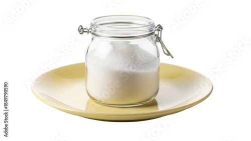 Isolated Jar of Sugar on Plate ready for baking or sweetening beverages on table