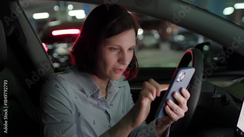 30s Woman Texting on Cellphone Sitting in Parked Car