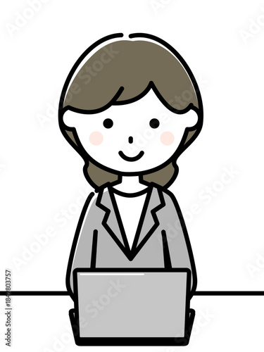 パソコンを操作するスーツの女性