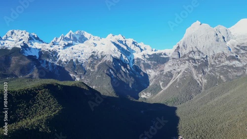Aerial footage of the stunning scenery of Yulong Snow Mountain in Lijiang [4K60]